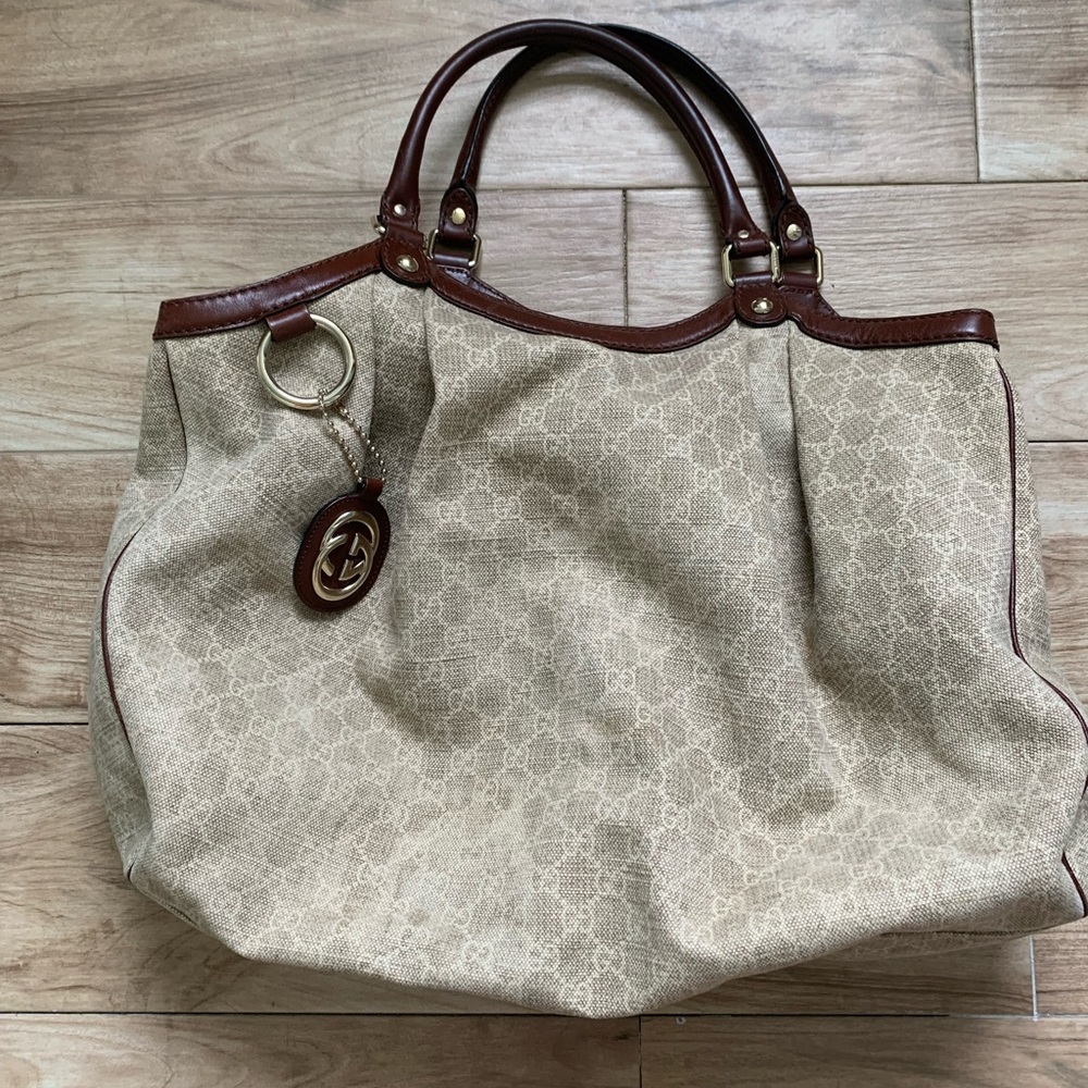 Authentic Gucci bag light beige with brown leather handles